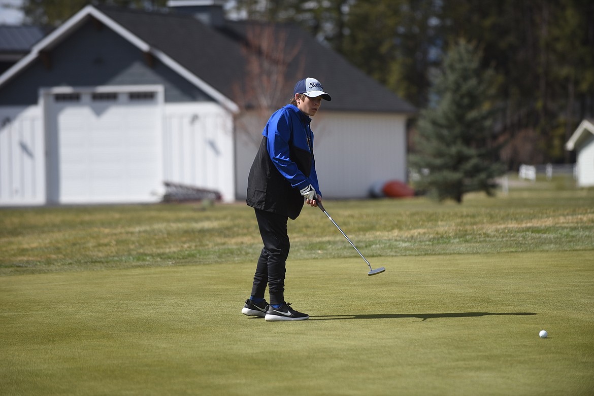 Thompson Falls' Cael Thilmony putts last week at Eagle Bend Golf Course in Bigfork. (Scott Shindledecker/Valley Press)