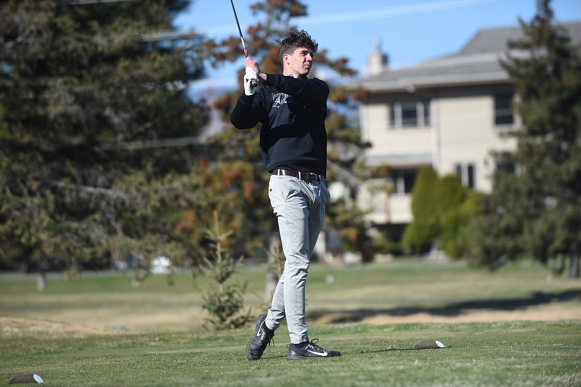 Thompson Falls' Kade Pardee watches his tee shot from No. 1 last week at Eagle Bend Golf Course in Bigfork. (Scott Shindledecker/Valley Press)