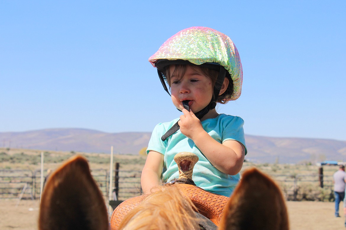 Emberly Huberdeau,one of the Washington State Horsemen North Central Club's youngest members, prepares for a key hole race on Saturday.