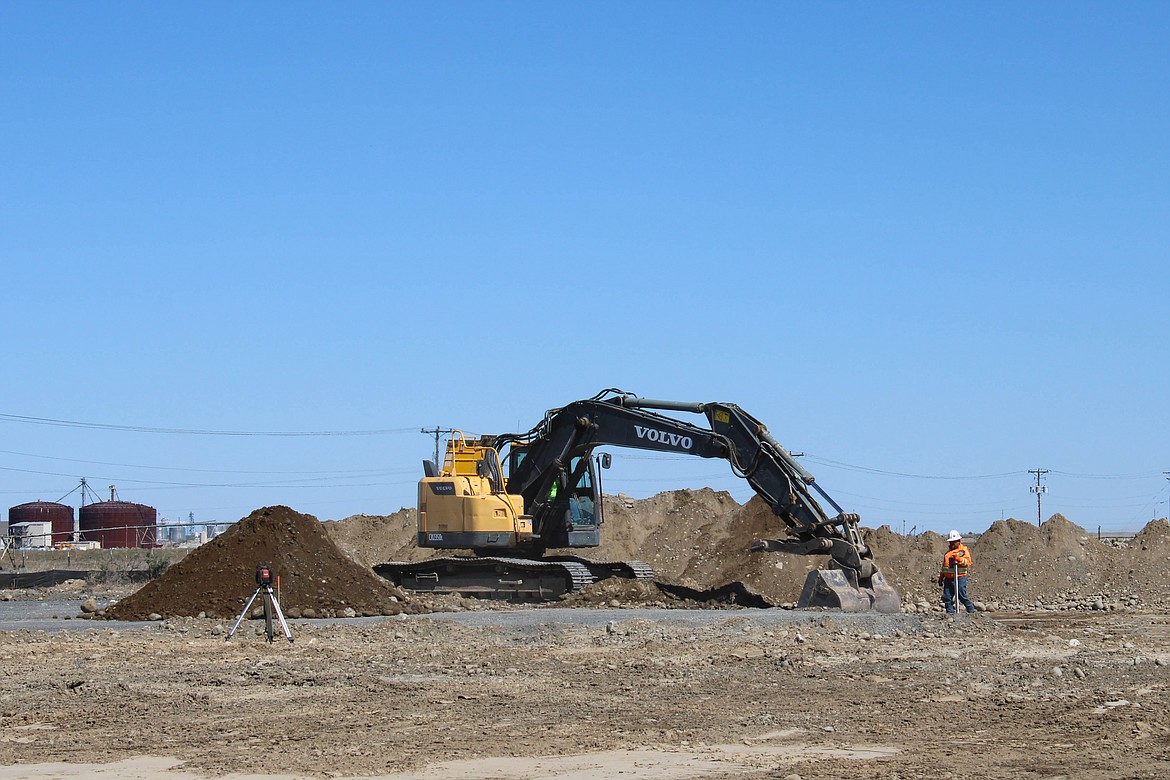Columbia River Excavation breaks ground for the new multi-agency facility at 12801 Road 2 NE on Monday.