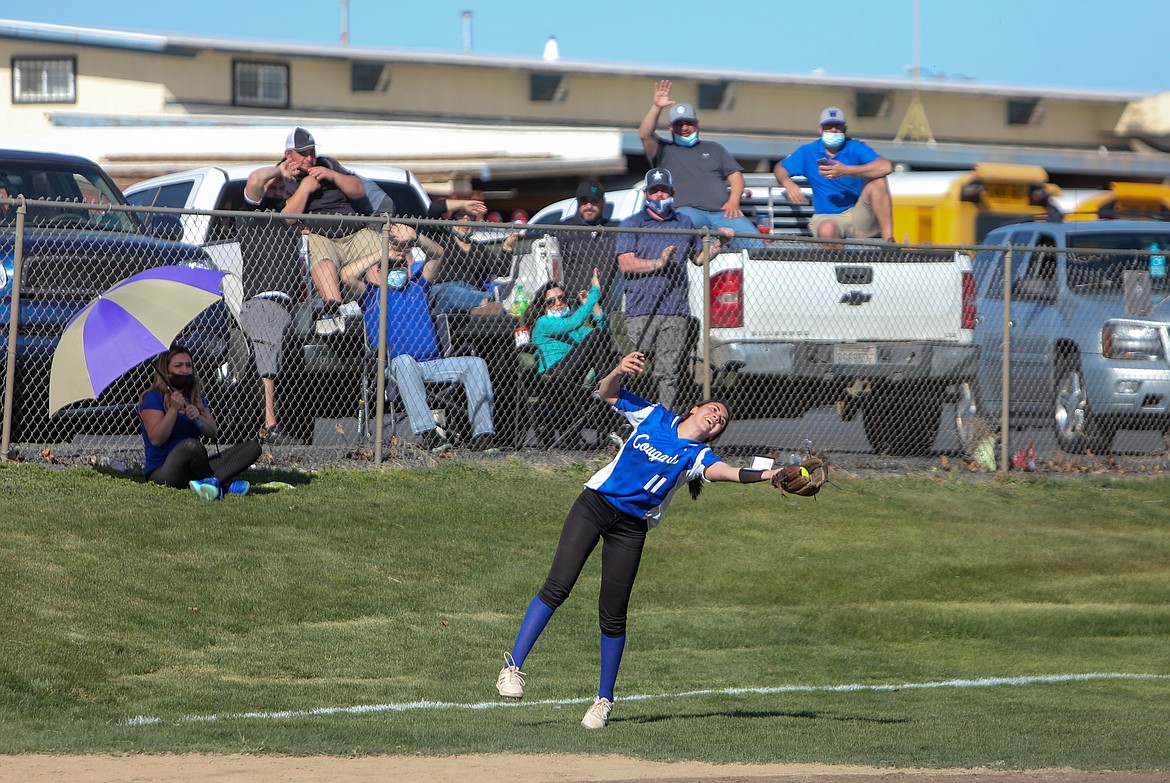 Warden's Aliza Leinweber adjusts to make the catch on a fly ball just off the third base line against Ephrata High School on Friday afternoon.