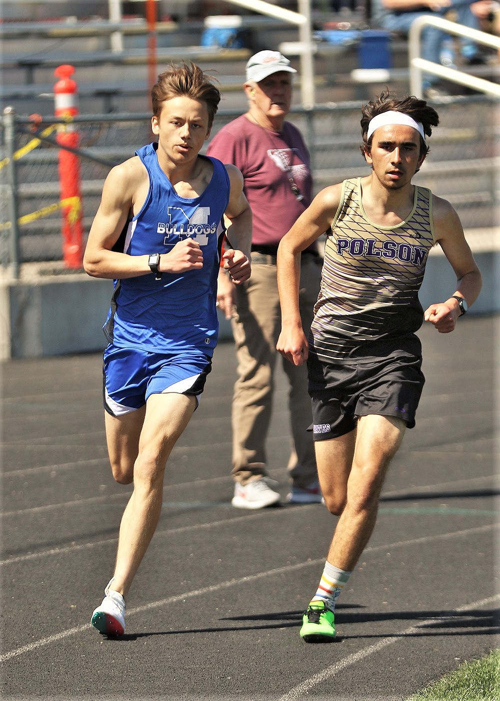 Andrew Rush of Mission, left, and Ryan Dupuis of Polson finished 1-2 in the boys 800 meters. (Courtesy of Bob Gunderson)