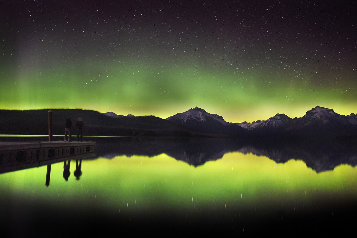 The aurora borealis lights up the skies over Lake McDonald inside Glacier National Park. (Jeremy Weber/Daily Inter Lake)