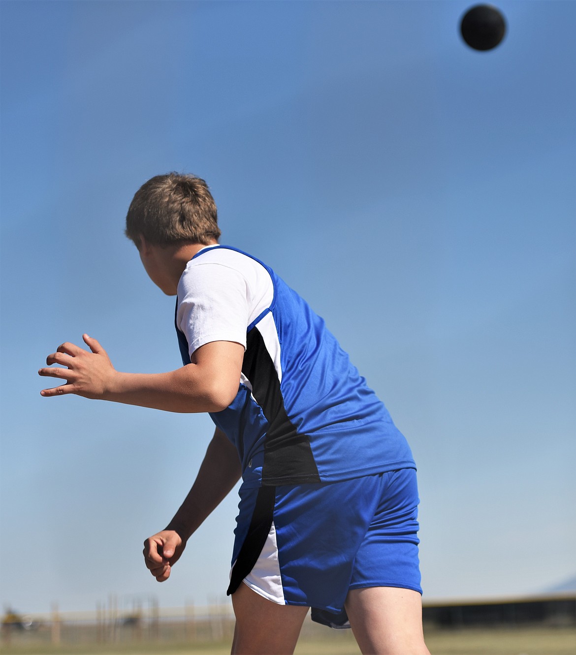 Mission's Canyon Sargent launches a throw during the boys discus competition Saturday at Ronan. (Scot Heisel/Lake County Leader)