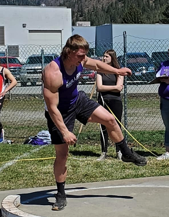 Mullan junior Luke Trogden throws the shot during Saturday's Track and Field event in Kellogg. Trogden took first place in the event.