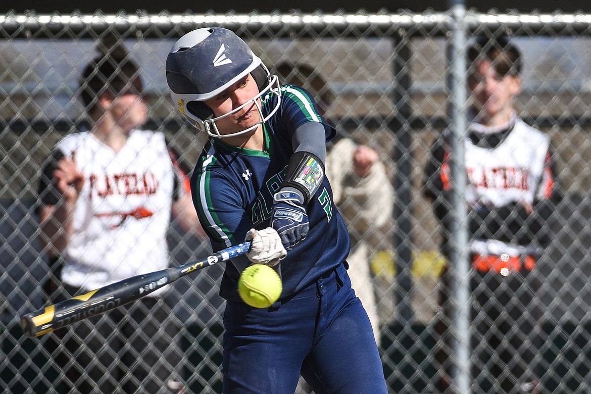 Glacier's Halle Schroeder (2) drives in Sammie Labrum (10) with an RBI single in the top of the seventh against Flathead during the first game of a crosstown doubleheader at Kidsports Complex on Tuesday. (Casey Kreider/Daily Inter Lake)