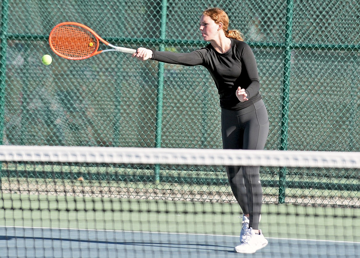 Whitefish sophomore Tallory Workman plays in the No. 1 girls doubles match with teammate Ali Hirsch against Havre on Saturday at FVCC. (Whitney England/Whitefish Pilot)