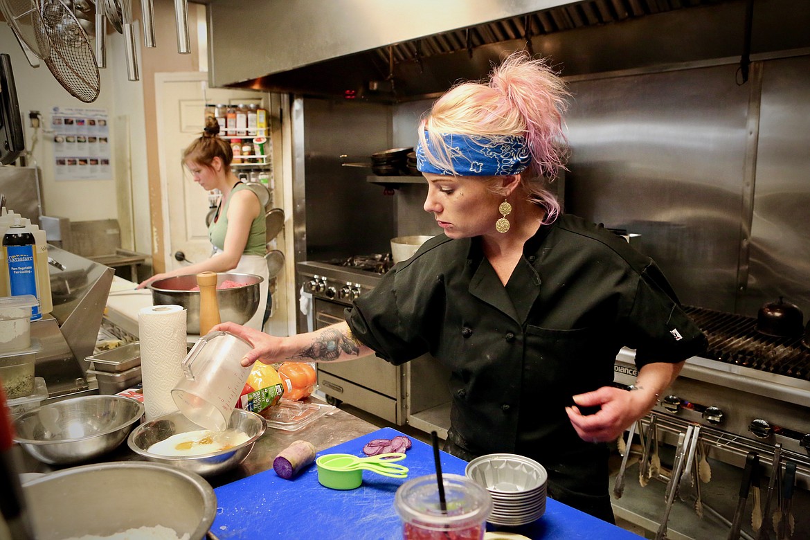 Head chef Shanita Lundin mixes ingredients for a pineapple upside down cake at Grille 459 on Monday afternoon.
Mackenzie Reiss/Bigfork Eagle