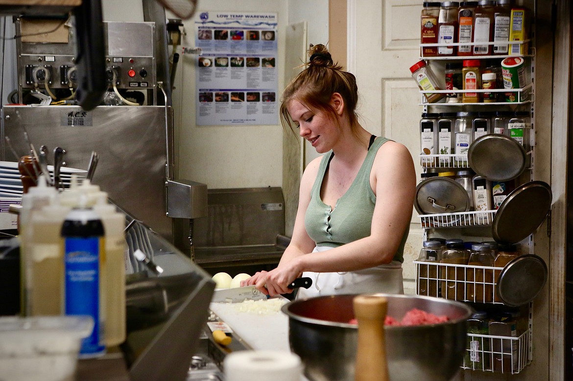 Sous chef Haley Doss chops onions prior to the dinner service on Monday night at Grille 459.
Mackenzie Reiss/Bigfork Eagle