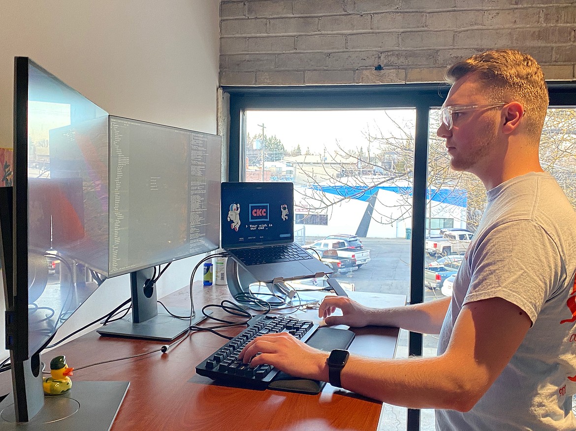 Logan Ruf working on Trailhead AI at CKC’s office on Lakeside