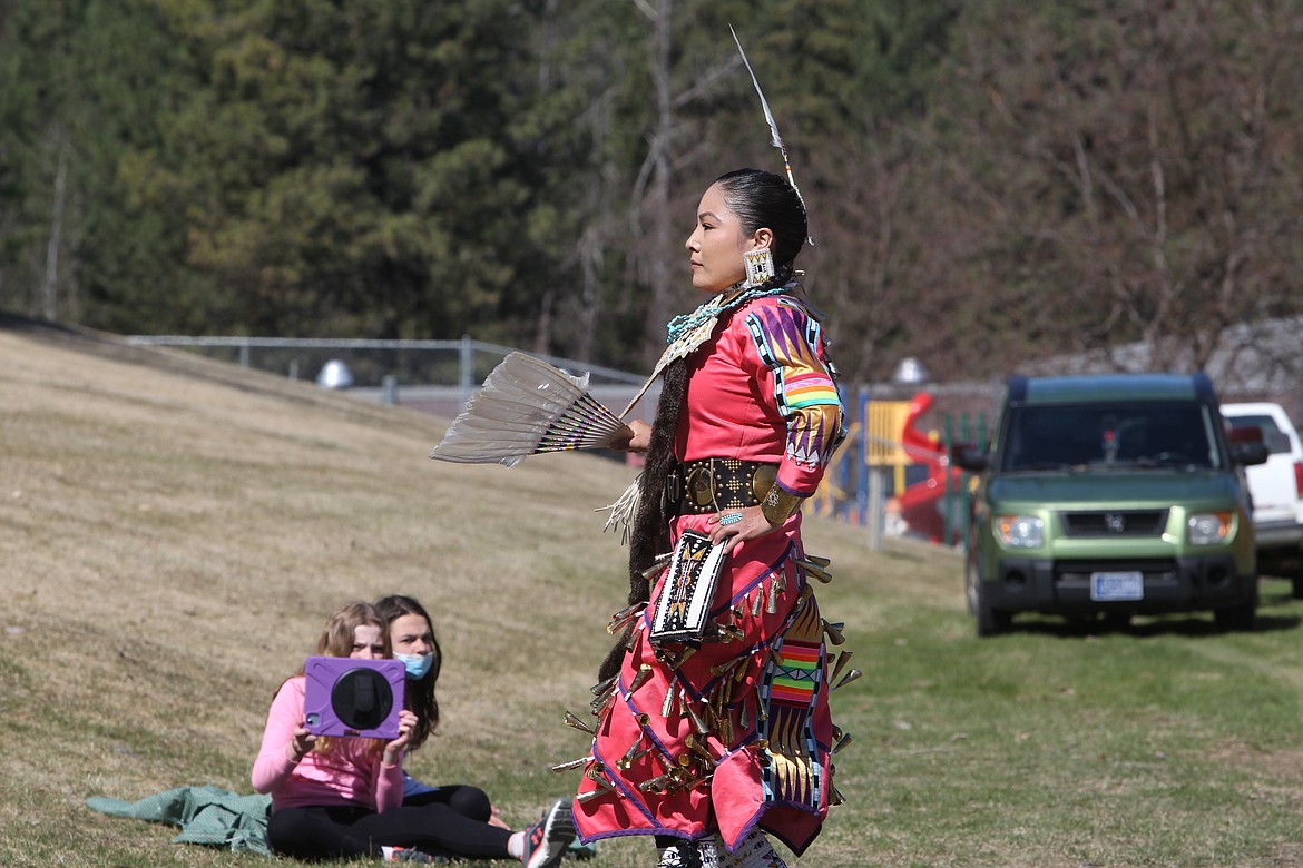 Crystal Little Owl demonstrates a grass dance to Libby Elementary School students on April 21. American Indians representing the Blackfeet, Cree and Gros Ventre visited the school to share some of their culture and regalia with students. (Will Langhorne/The Western News)