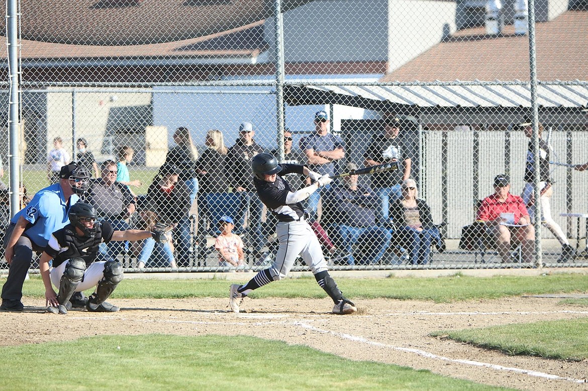 Almira-Coulee-Hartline High School's Cooper Correia fires a shot for the Warriors from the plate. Correia was selected as a WIAA Athlete of the Week for his performance against Omak last weekend.