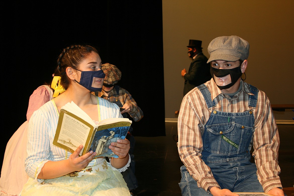 Brianna Herrera and Rami Escure chat during a scene break in the Quincy High School production of "Anne of Green Gables."