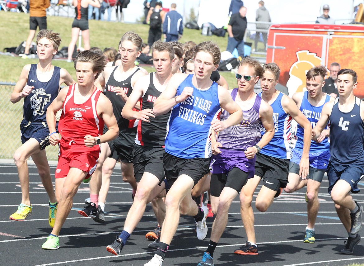 JASON ELLIOTT/Press
Coeur d'Alene's Braden Dance leads a pack of 22 runners out of the starting line in the 3,200-meter run during Friday's Christina Finney Relays meet at Post Falls High.