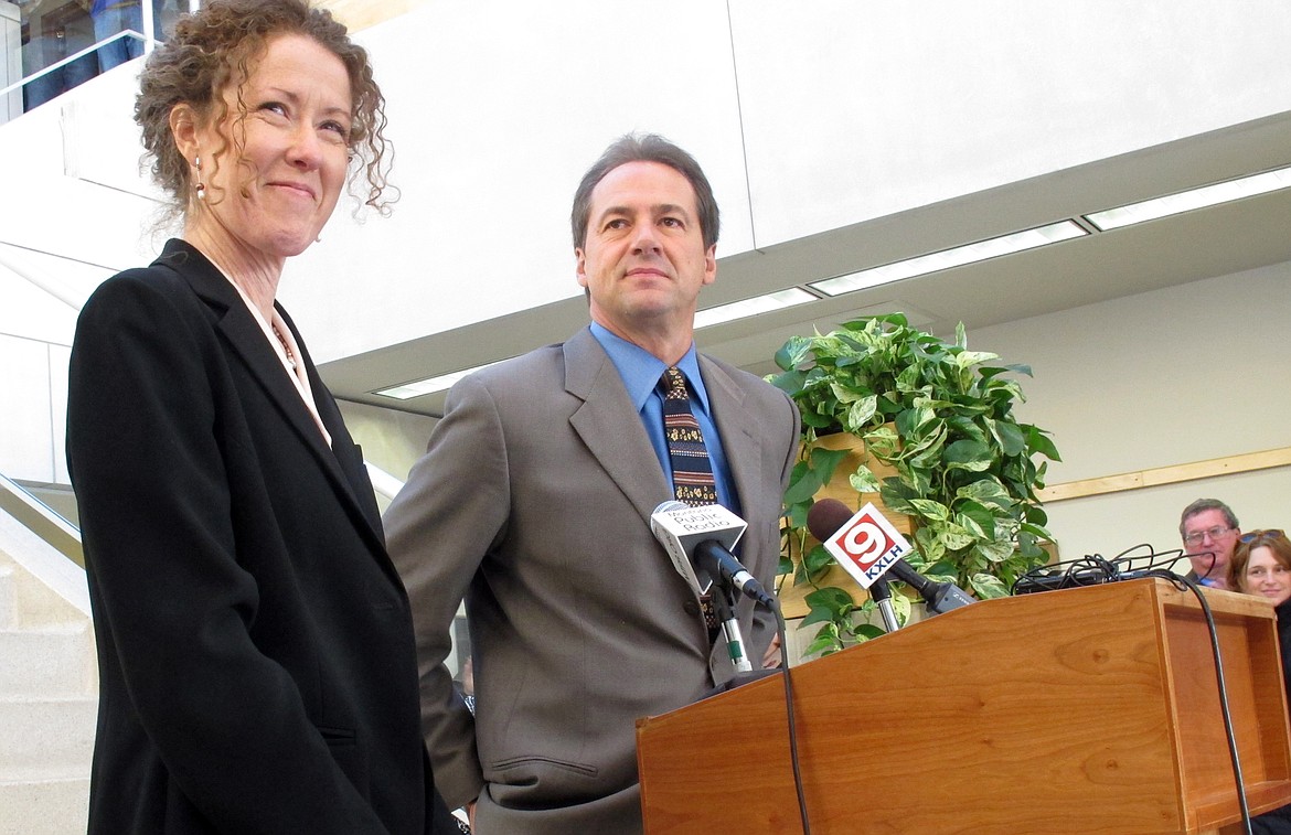 In this Dec. 14, 2012, file photo, Tracy Stone-Manning, left, is named by Gov.-elect Steve Bullock to run the Montana Department of Environmental Quality, in Helena, Mont. Stone-Manning has been nominated by President Joe Biden to lead an agency that oversees about a quarter-billion acres of public lands in western states.