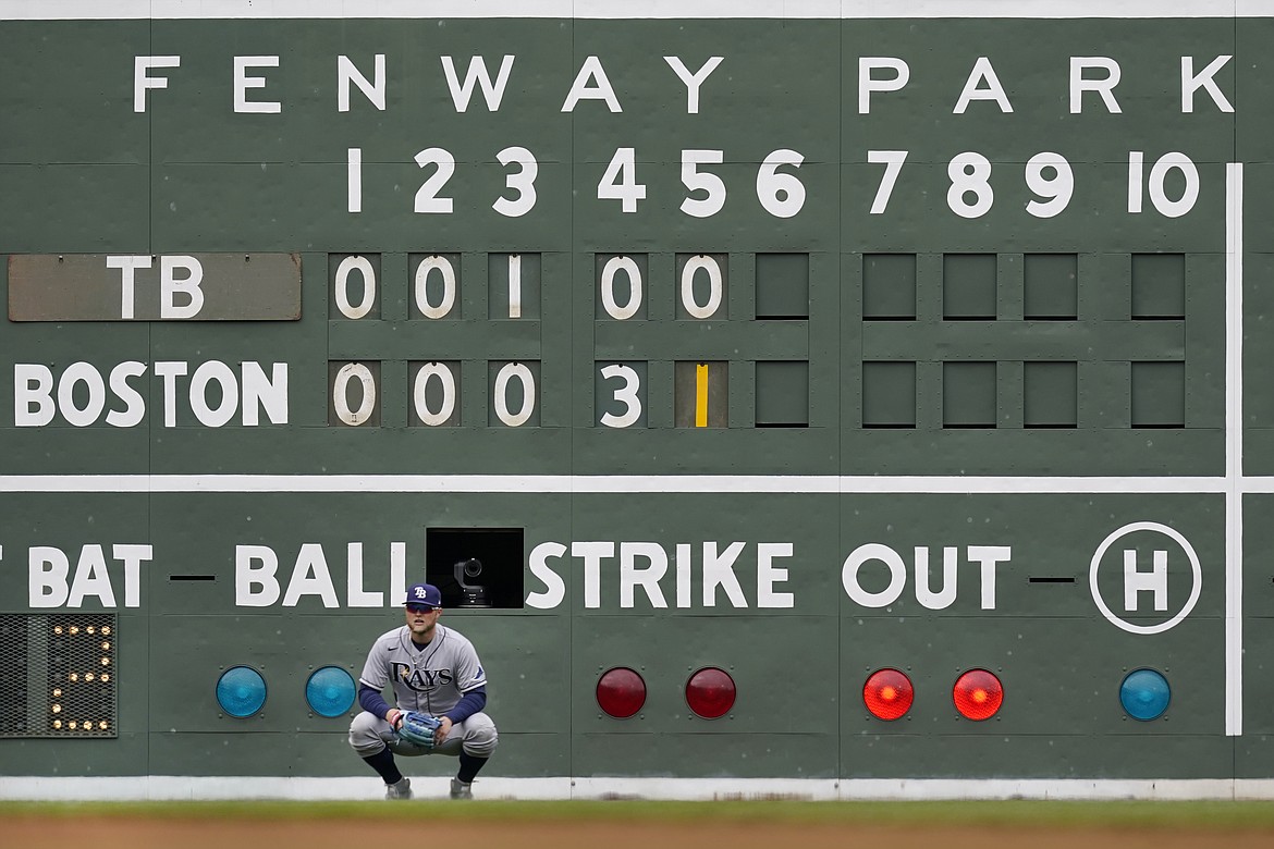 ELISE AMENDOLA/Associated Press
The scoreboard in the Green Monster is just one of the many traditions of Fenway Park in Boston.