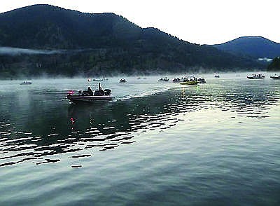 Anglers head out for a day of fishing during a 2014 tournament on Noxon Reservoir. State officials have plans to remove invasive weeds from the waterway to improve conditions. (Clark Fork Valley Press file photo)