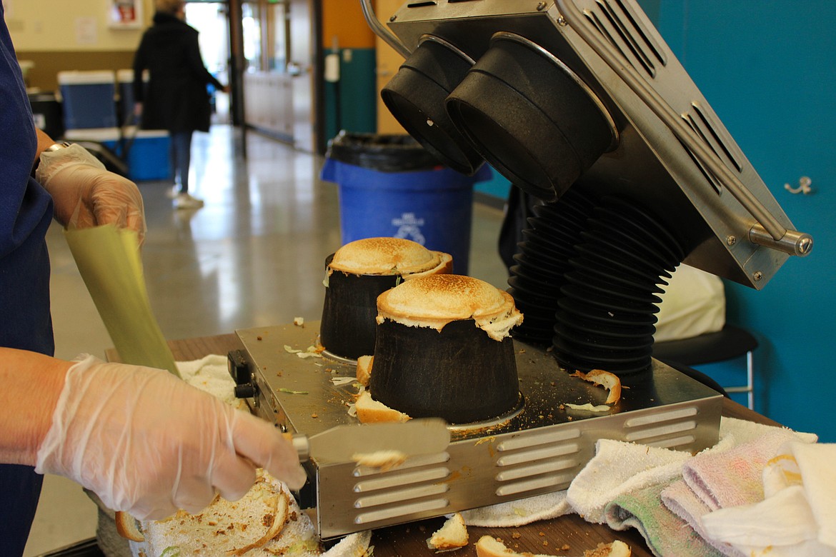 Fresh spaceburgers, out of the spaceburger machine first attained in 1969, at the Spaceburger Fest on Saturday.