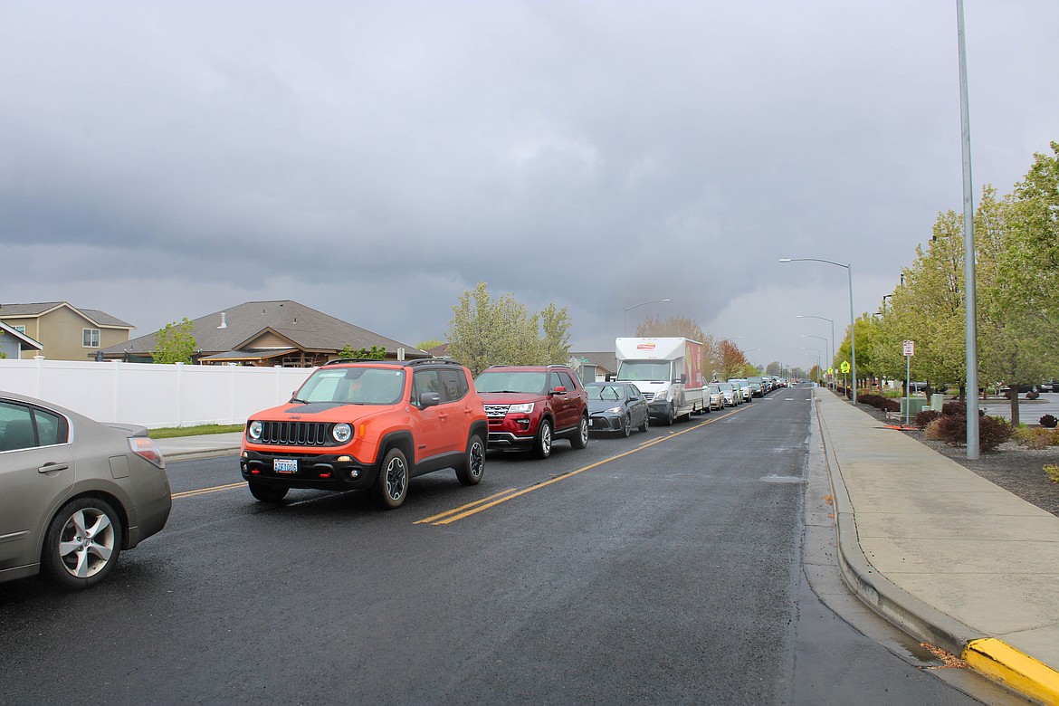 Cars lined down Paxson Drive in Moses Lake for the Spaceburger Fest on Saturday.