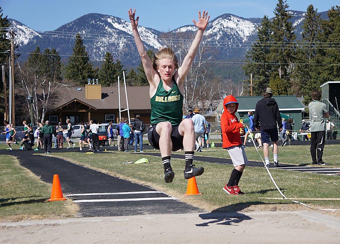 Bulldog Azure Stolte competes in the long jump at Whitefish High School on Tuesday, April 20. (Matt Weller photo)