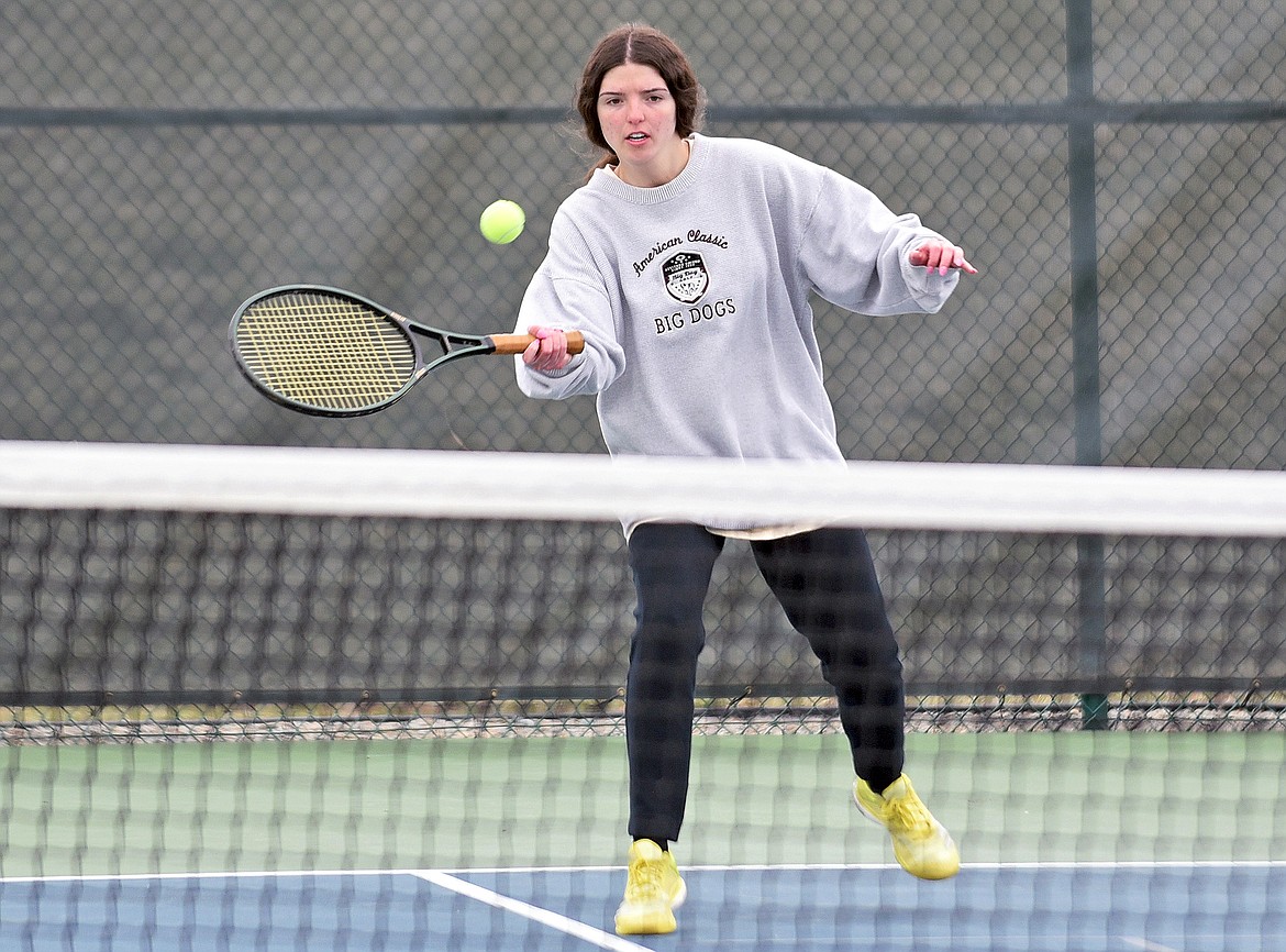 Whitefish junior Ashley Gunset plays in a doubles match against Flathead High School on Friday at FVCC. (Whitney England/Whitefish Pilot)