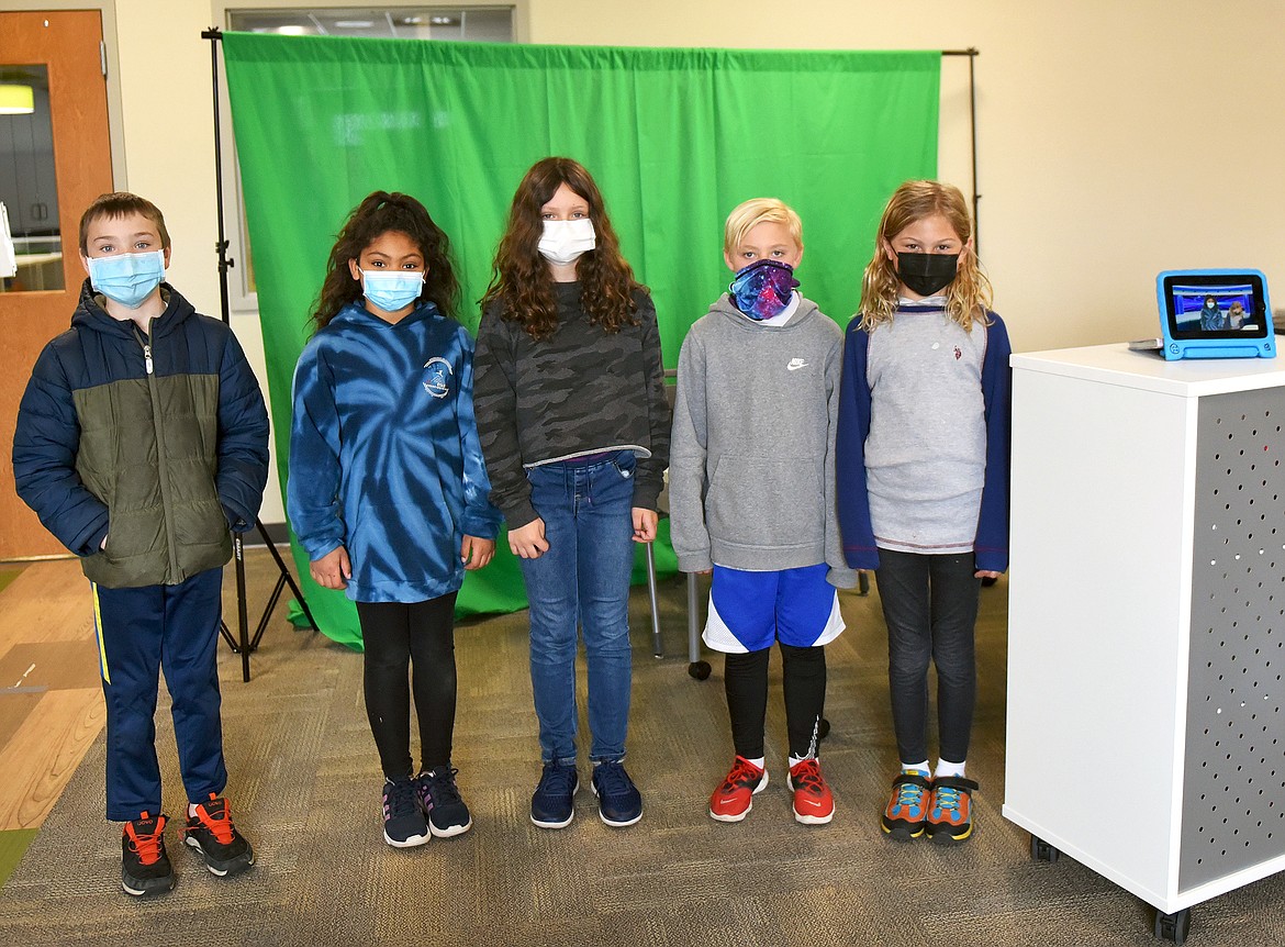 A group of students at Muldown gathers every school day at 2:30 p.m. to record the Muldown News for the following day. The student-led program launched last month at the elementary school. From left to right, Hudson Clark, Audrey Jones, Gianna Mitchell, Kaleb Stevens and Elijah Walrath. (Whitney England/Whitefish Pilot)