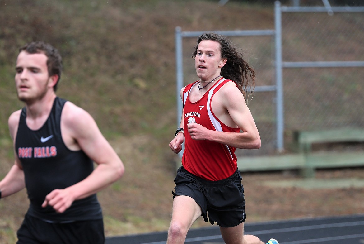 Jett Lucas passes multiple runners in the final stretch of the 3200 on Saturday.