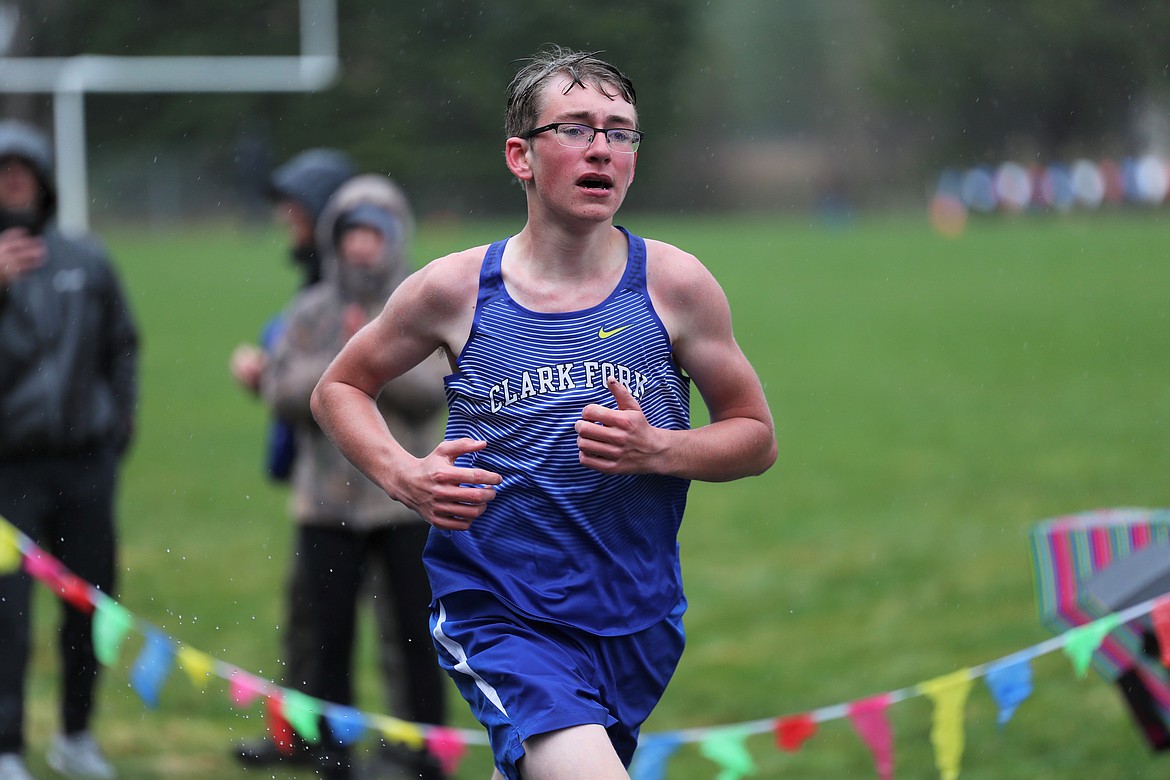 Ryan Matteson crosses the finish line in the 1600 on Saturday.