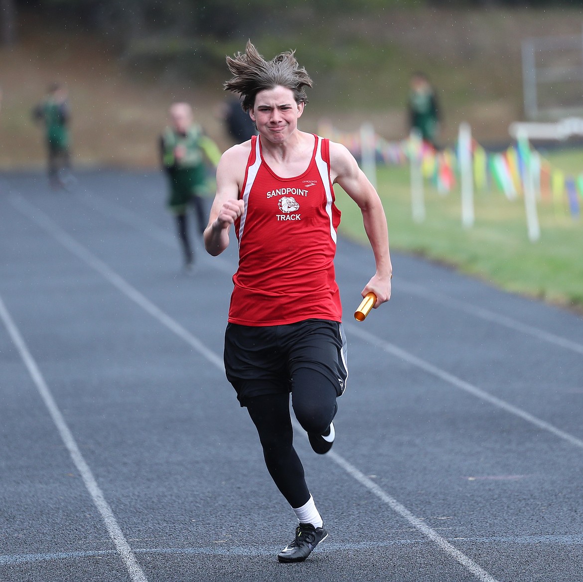 Ryder Haynes grinds toward the finish of the 4x100 relay.