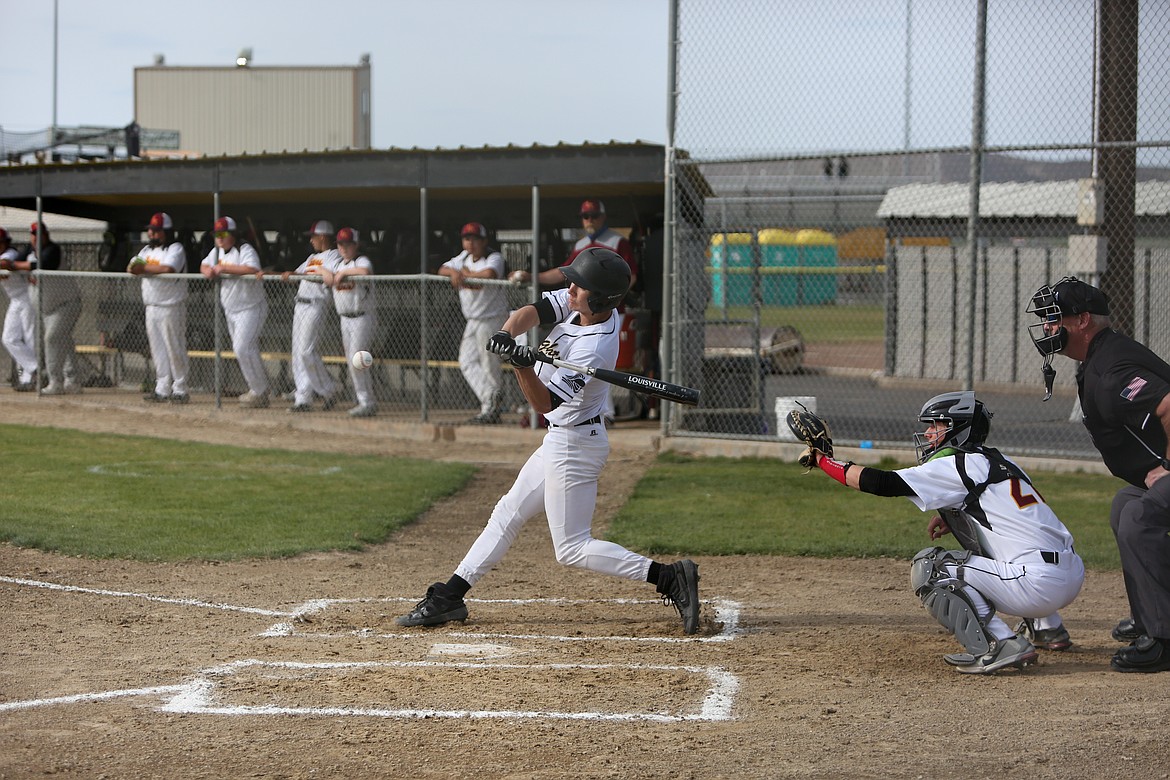 Luke Bergeson makes a hit for Royal High School in the bottom of the first inning against Lake Roosevelt on Tuesday afternoon in Royal City.