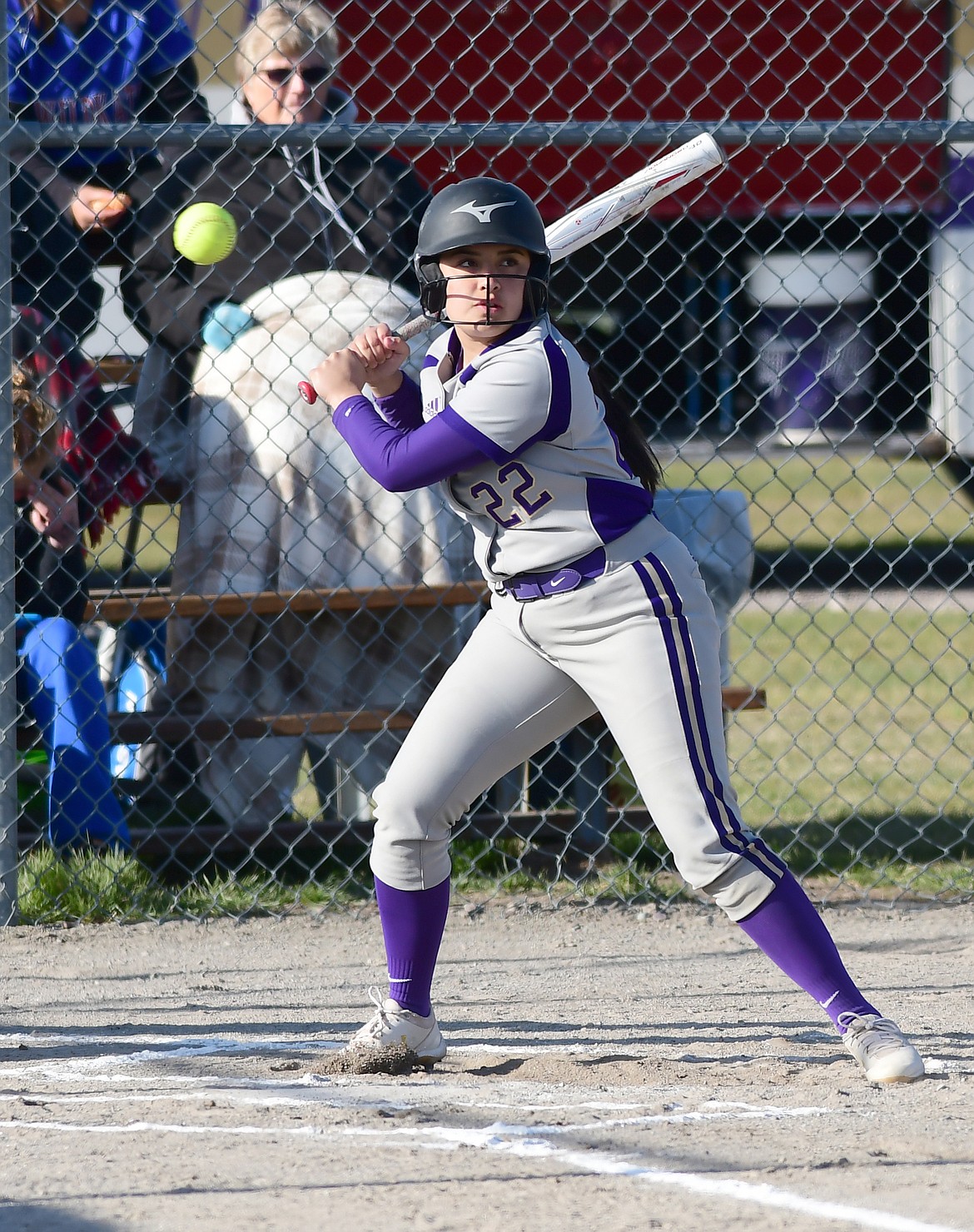 SaVanna Carpentier takes a pitch against Columbia Falls. (Teresa Byrd/Hungry Horse News)