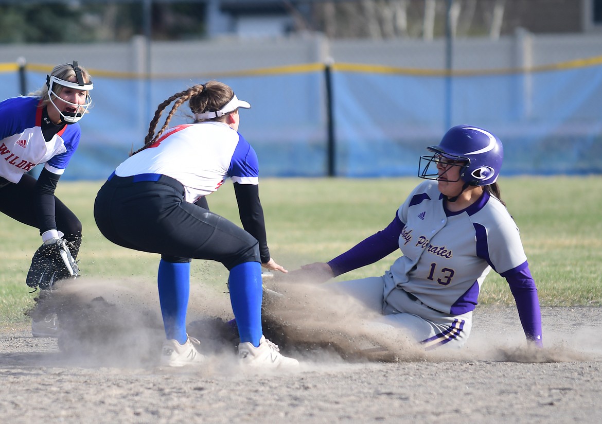 Mossy Kauley slides into second base against Columbia Falls. (Teresa Byrd/Hungry Horse News)