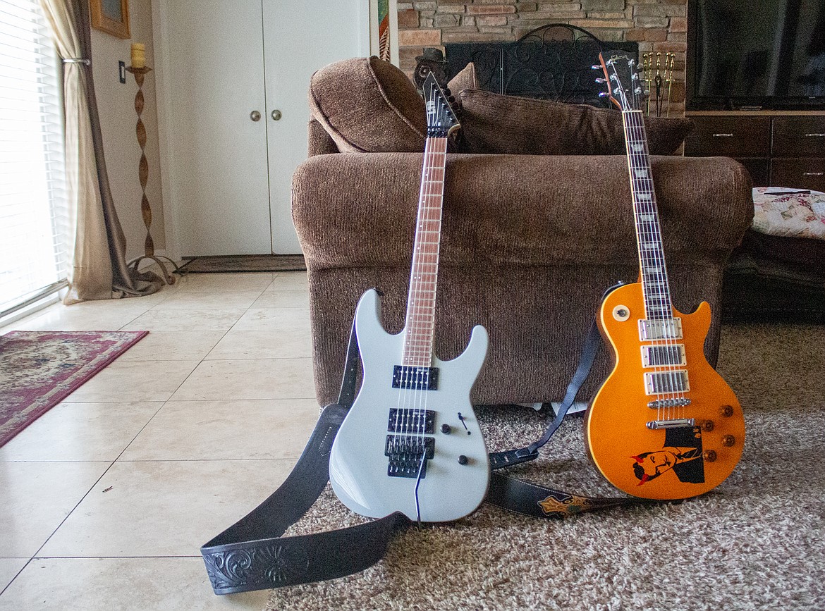 Gunnar Rimple's LTD and Gibson Les Paul electric guitars are the two out of his collection that he said he comes back to play with the most.