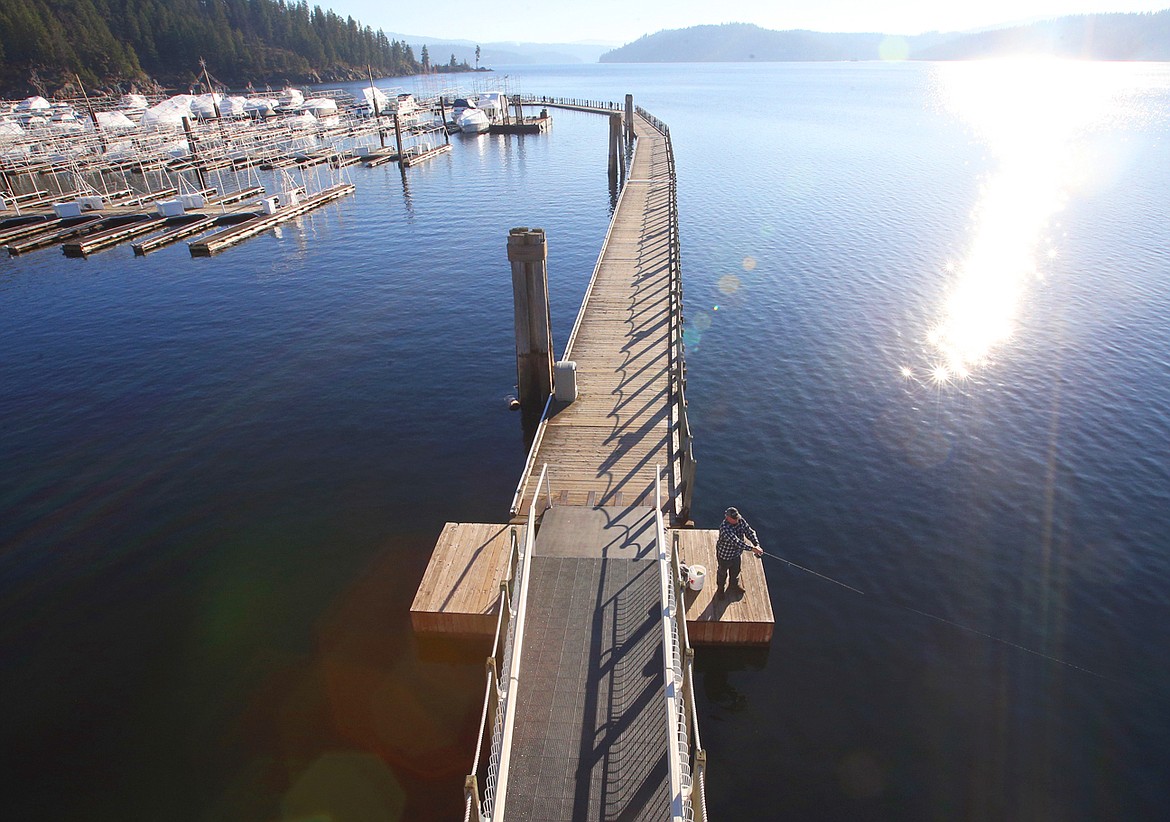 Gov. Brad Little announced Friday the formation of a new advisory committee to appropriate $2 million in state funding to preserve the health of Lake Coeur d'Alene. In this file photo an angler drops a line in Lake Coeur d'Alene off The Boardwalk at The Coeur d'Alene Resort.