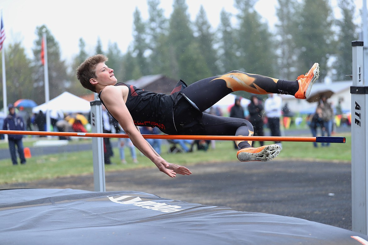 Bradley Gleason competes in the high jump on Saturday.