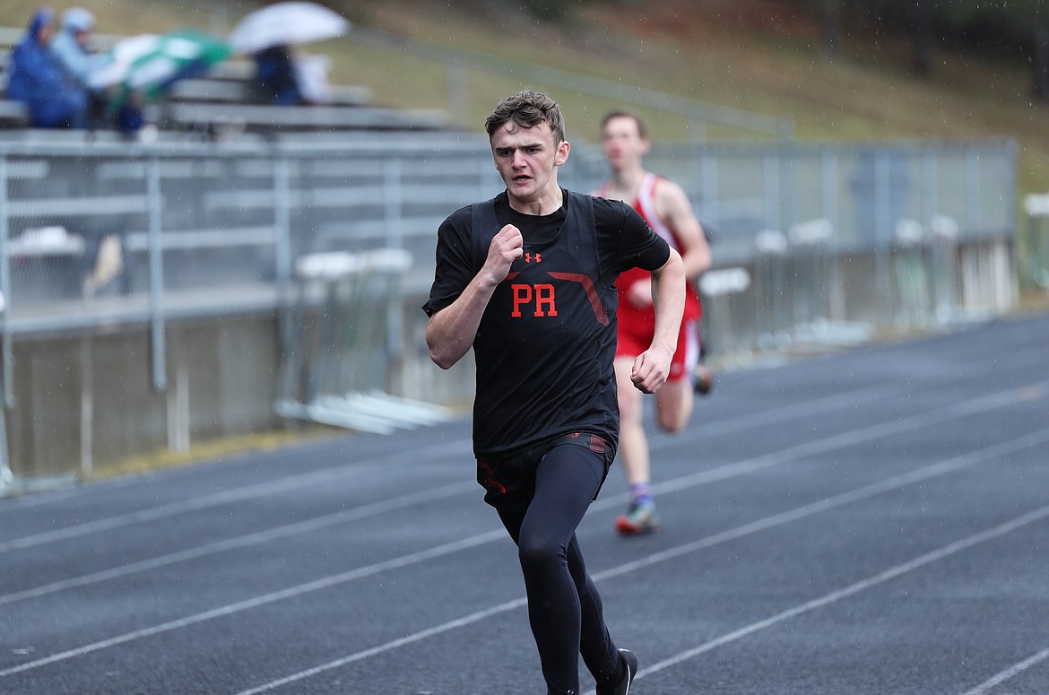 Jimmie Isenberger runs in the 400 on Saturday.