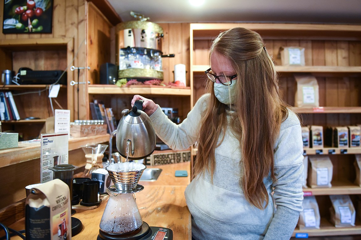 Jen Sidor brews a cup of Montana Coffee Traders'  '81 blend, a special edition of their signature espresso blend for the company's 40th anniversary at the mercantile in Whitefish on Wednesday. (Casey Kreider/Daily Inter Lake)