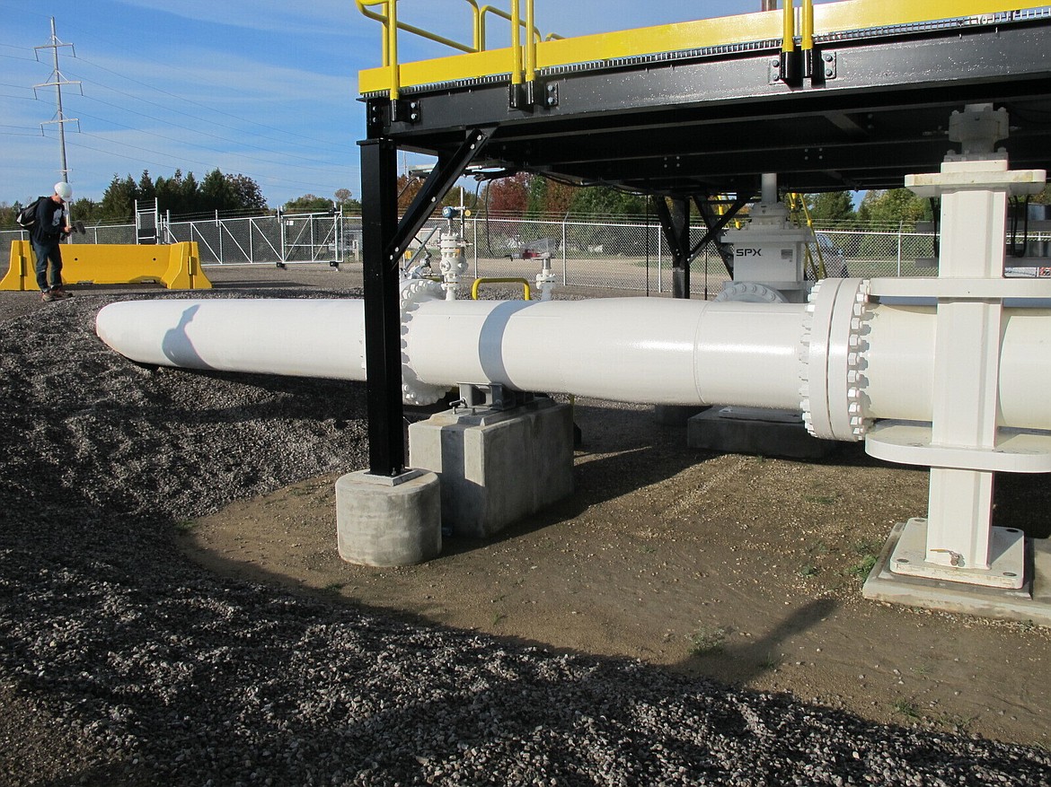 This photo taken in October 2016 shows an aboveground section of Enbridge's Line 5 at the Mackinaw City, Mich., pump station. Michigan Gov. Gretchen Whitmer has ordered the pipeline shut down because of concerns about a potential spill in the channel that connects Lake Huron and Lake Michigan. Enbridge is resisting the order with the support of Canadian officials who say Line 5 is essential to their economy. The disagreement comes months after U.S. President Joe Biden upset Canada by canceling the Keystone XL oil pipeline project.(AP Photo/John Flesher)