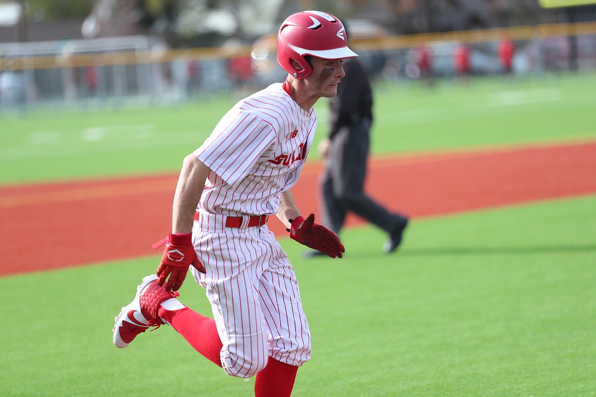 Cameron Garcia runs toward home on Tuesday.