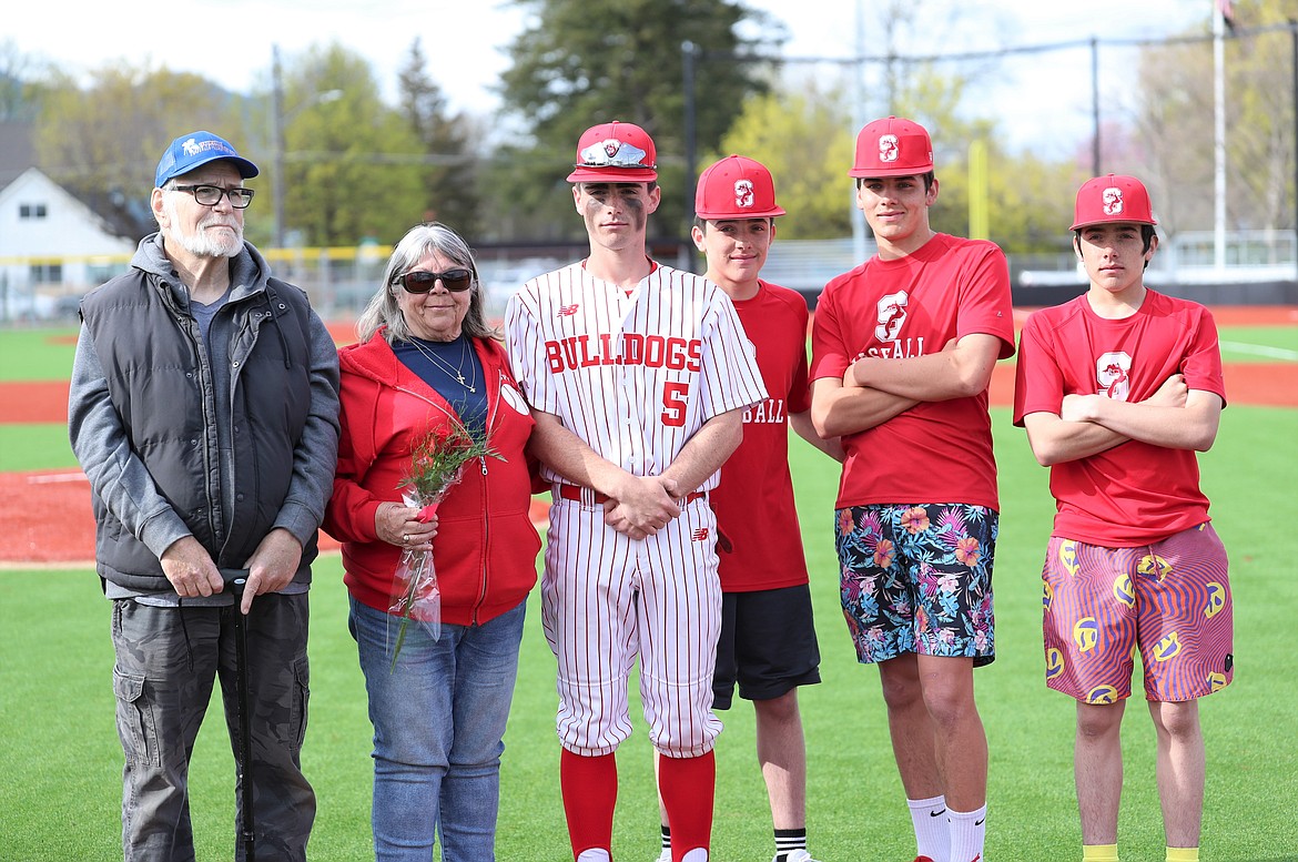 Cameron Garcia celebrates with family on Senior Night.