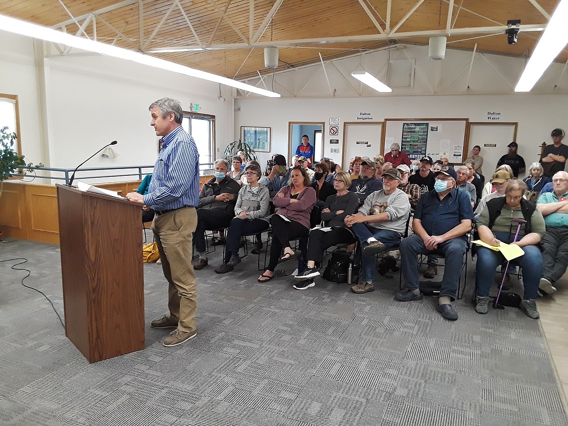 Dalton Gardens resident Chris Laviola spoke against the idea of hunting deer within city limits Wednesday night. "That's the price of living in a rural area," he said. (CRAIG NORTHRUP/Press)