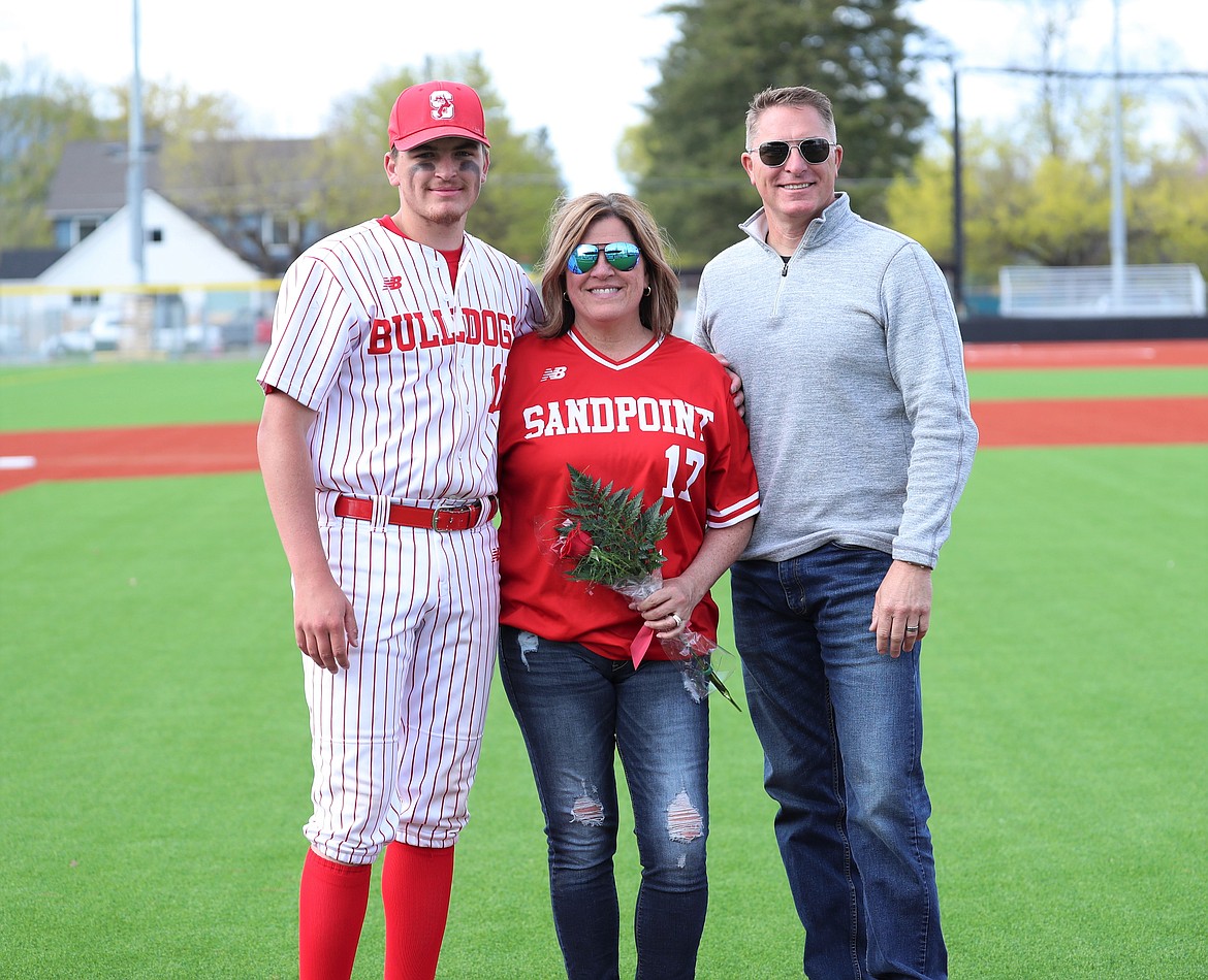 Evan Williams celebrates with family on Senior Night.