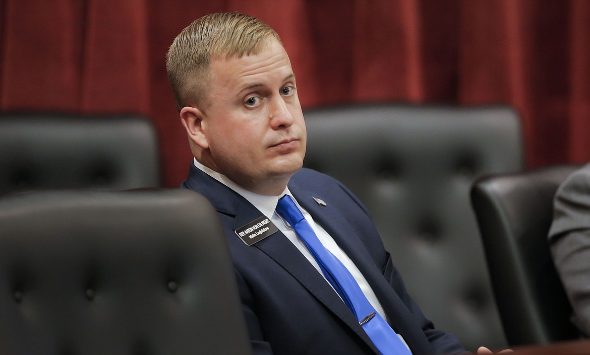 State Rep. Aaron von Ehlinger, R-Lewiston, listens as an alleged victim, identified as Jane Doe, offers testimony during a hearing before the Idaho Ethics and House Policy Committee, Wednesday, April 28, 2021, in the Lincoln Auditorium at the Idaho Statehouse in Boise, Idaho. Von Ehlinger was before the committee to face sexual misconduct allegations with a 19-year-old volunteer staff member during the current legislative session. (Darin Oswald/Idaho Statesman via AP)