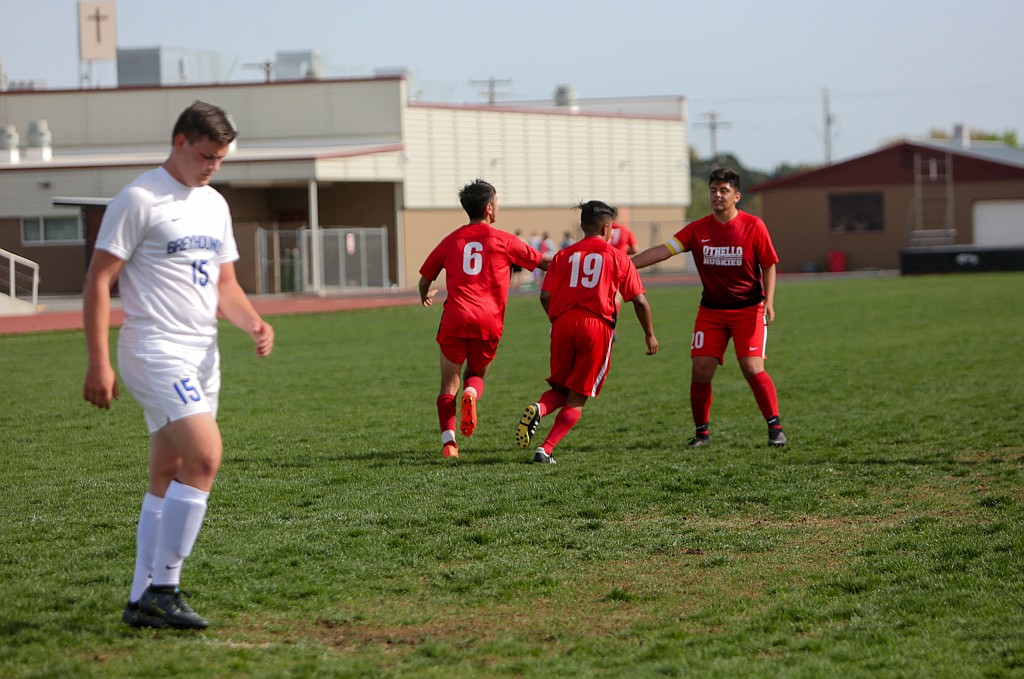 Anthony Ontiveros (6) celebrates with his teammates after putting away the penalty kick in the first half to give the Huskies the 1-0 lead against Pullman High School on Thursday in Othello.