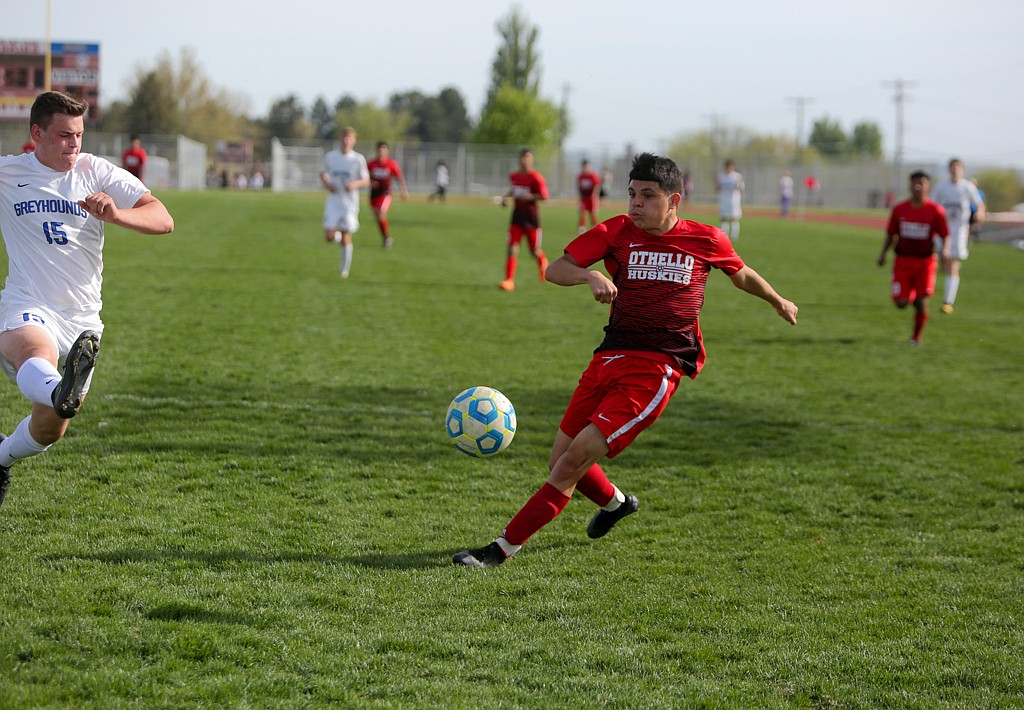 Miguel Ramirez fires a shot toward goal for Othello High School on Thursday afternoon in the 1-0 win over Pullman High School in Othello.