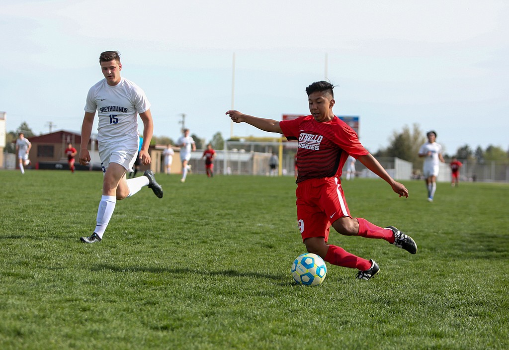 Juan Diego Lauriano fires in a cross from the side of the field in the first half for Othello High School in the win at home over Pullman on Thursday afternoon.