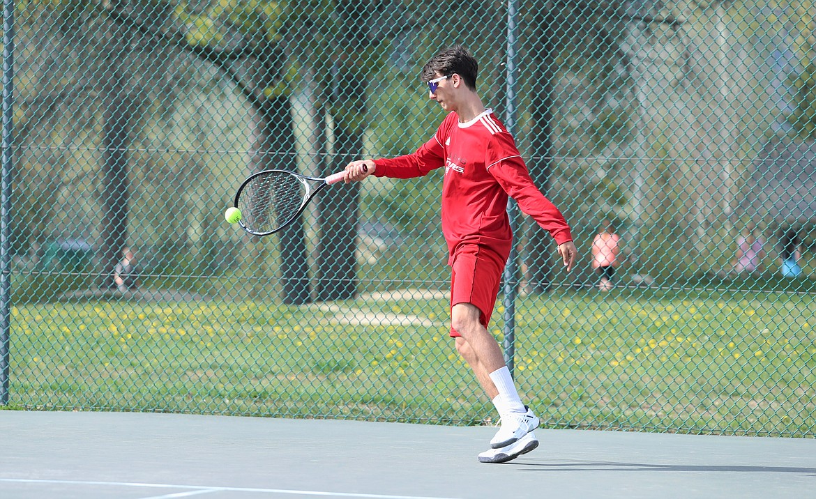 Aden Heitz returns a shot on Thursday.