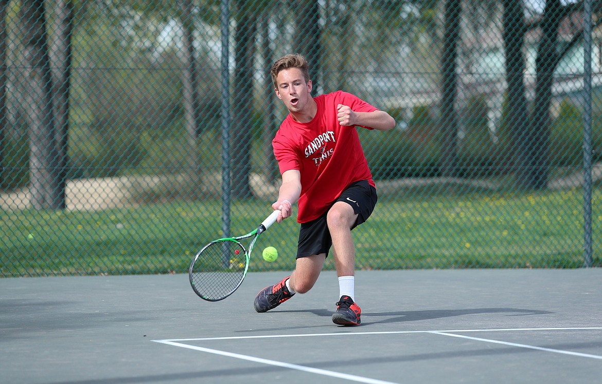 Christian Story gets down low to return a shot on Thursday.