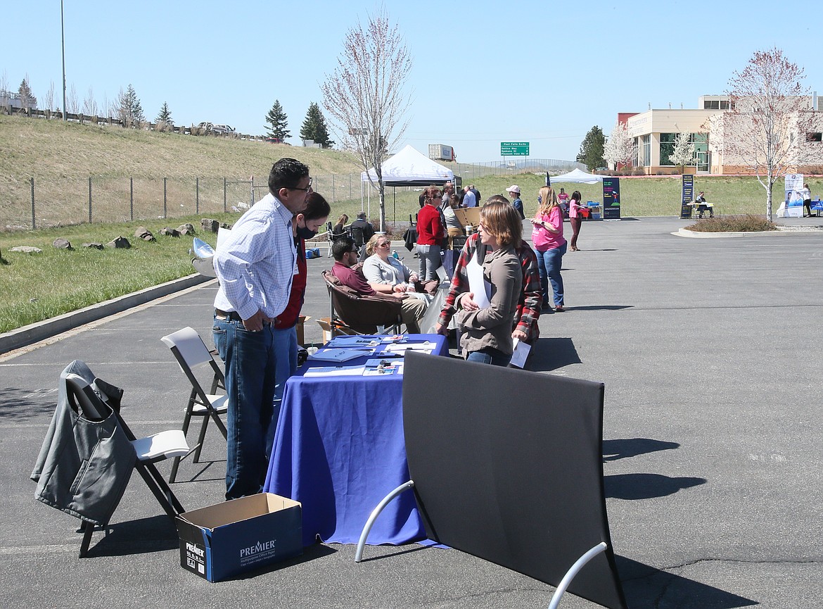 The Idaho Department of Labor held a drive-through job fair April 21 at its office in Post Falls. Employers are struggling to attract employees across industries in North Idaho. Some are increasing wages and tacking on bonuses just to retain workers through the summer.