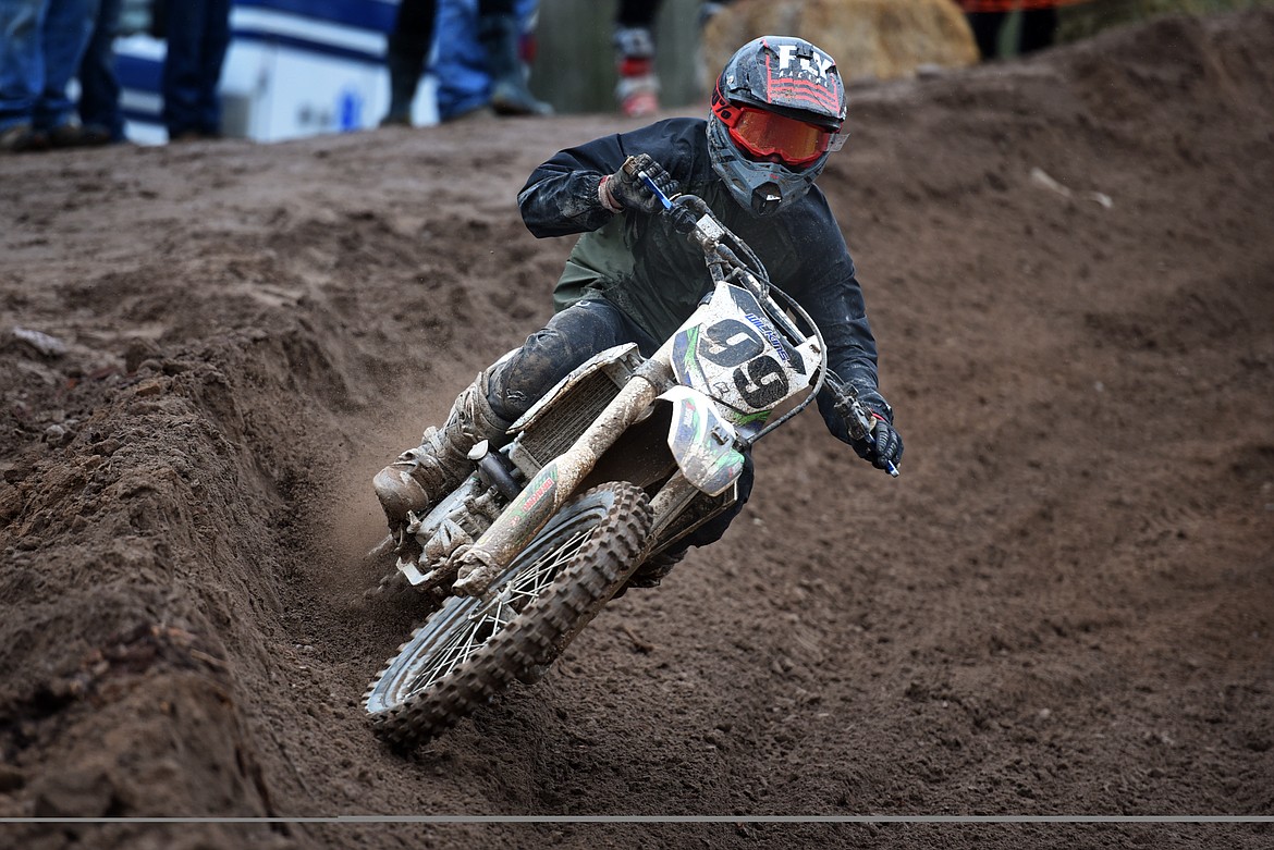 Jesse Wilkins makes his way around a turn on his way to a third place finish in the 250 junior division of the Hungry Horse motocross races April 24. (Jeremy Weber/Daily Inter Lake)